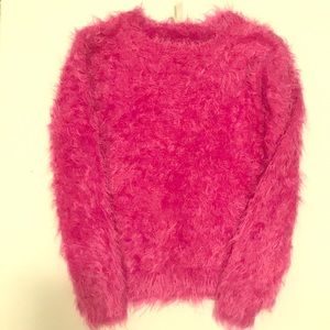 Long-sleeved sweater in a soft, fluffy fine knit.